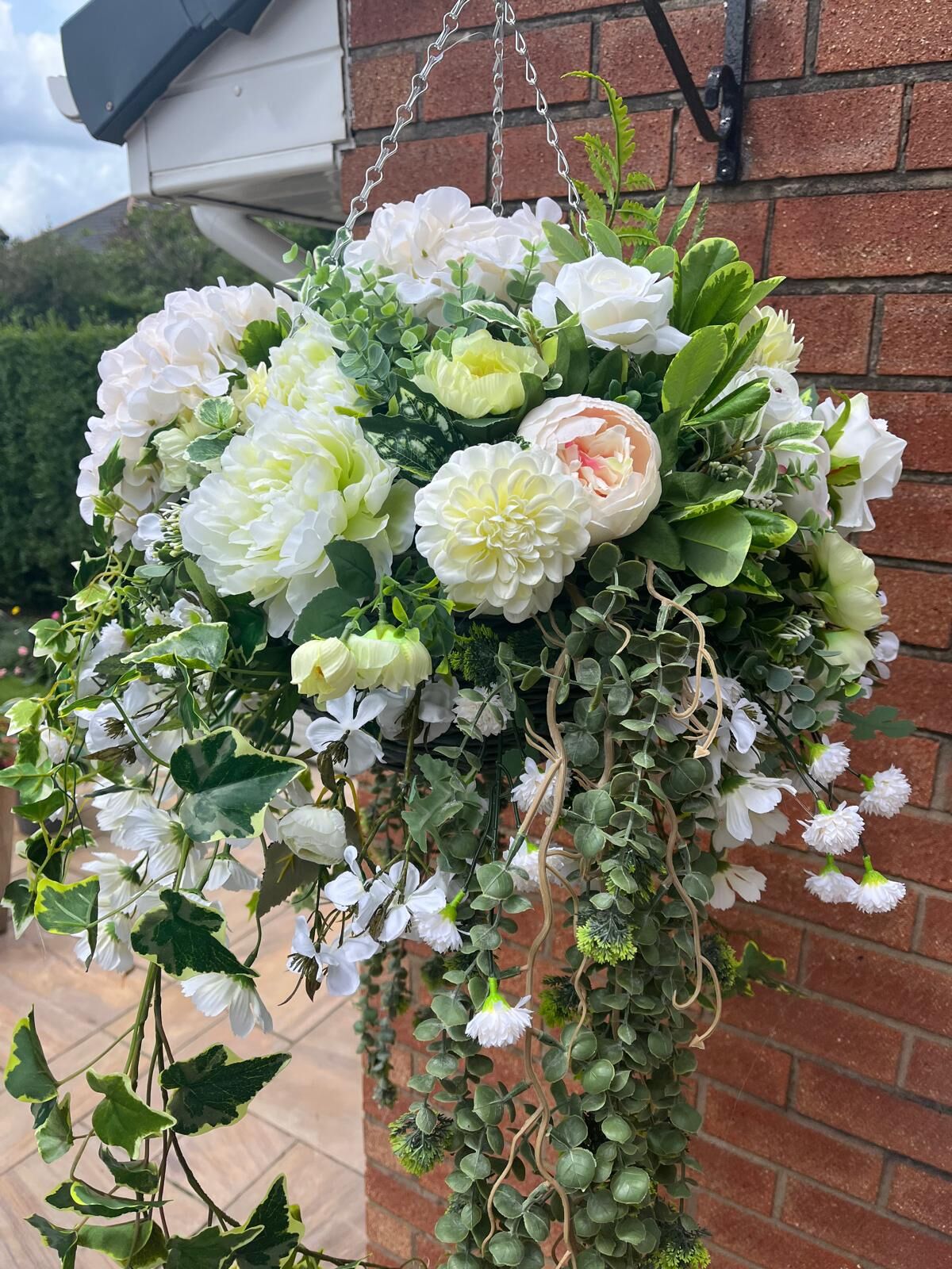Handmade faux flower hanging basket in whites and greens